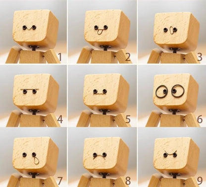 Charmig träfigur med 12 magnetiska ansikten